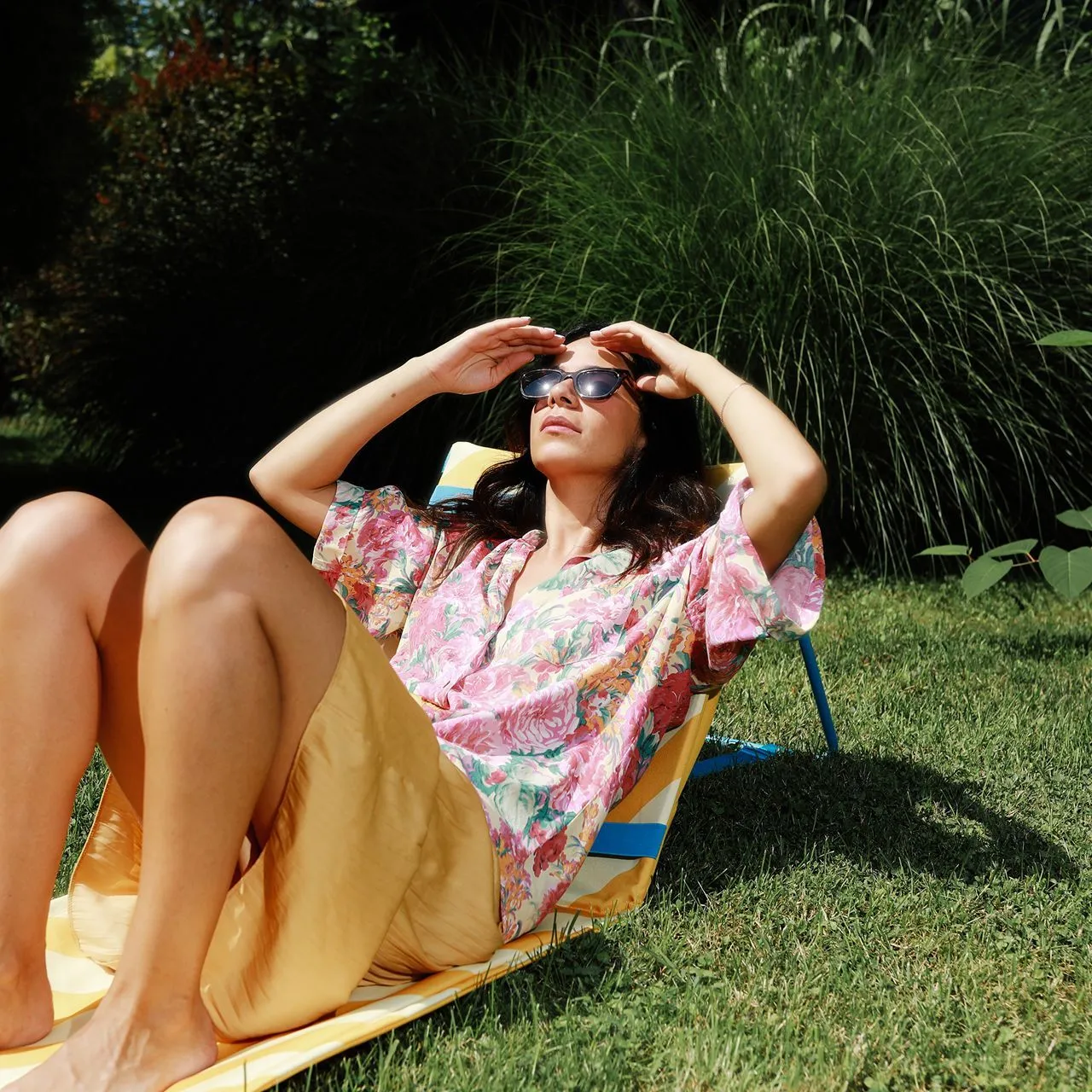 Picture of a woman relaxing in the sun.