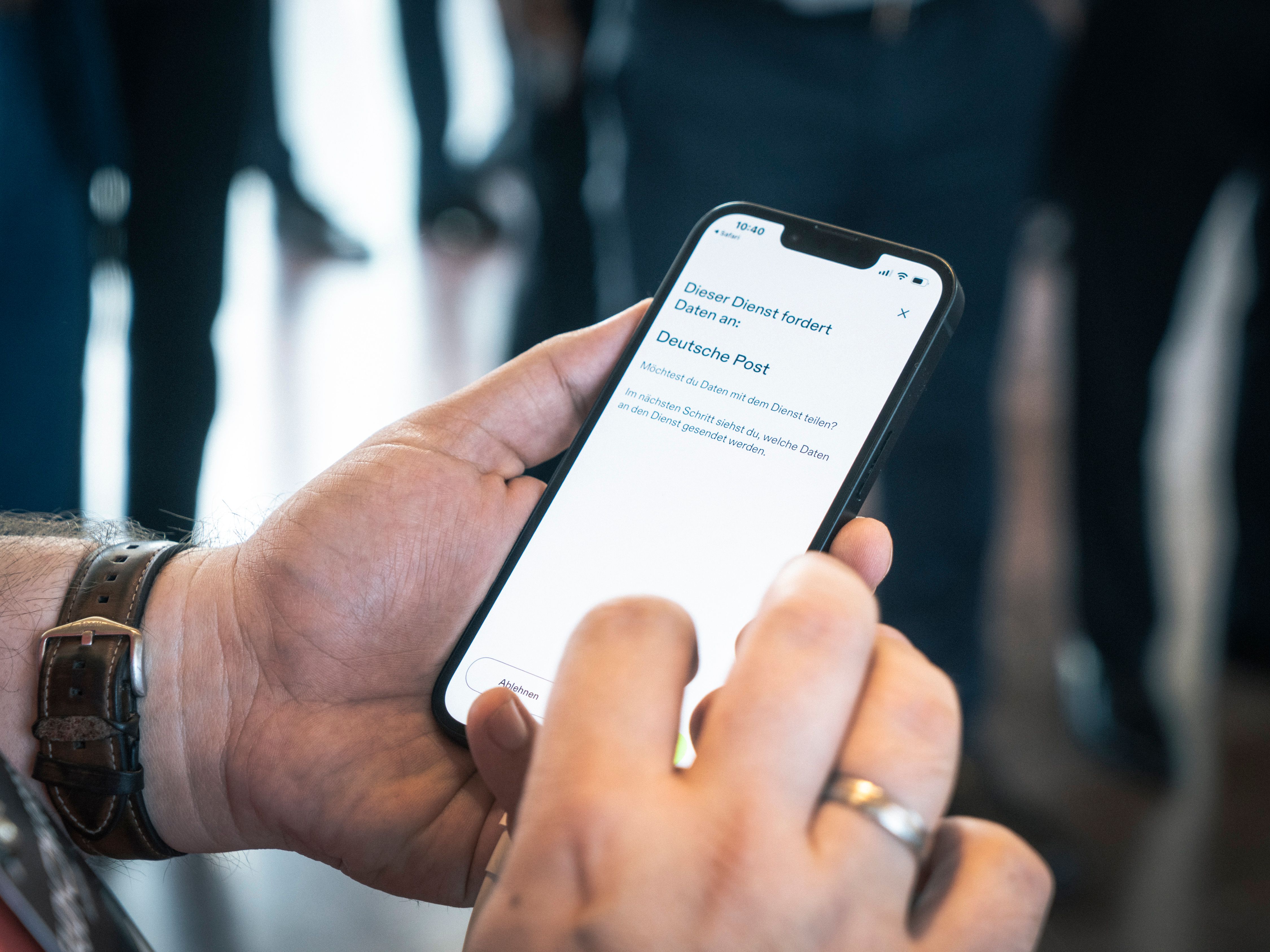 A person holds a smartphone.