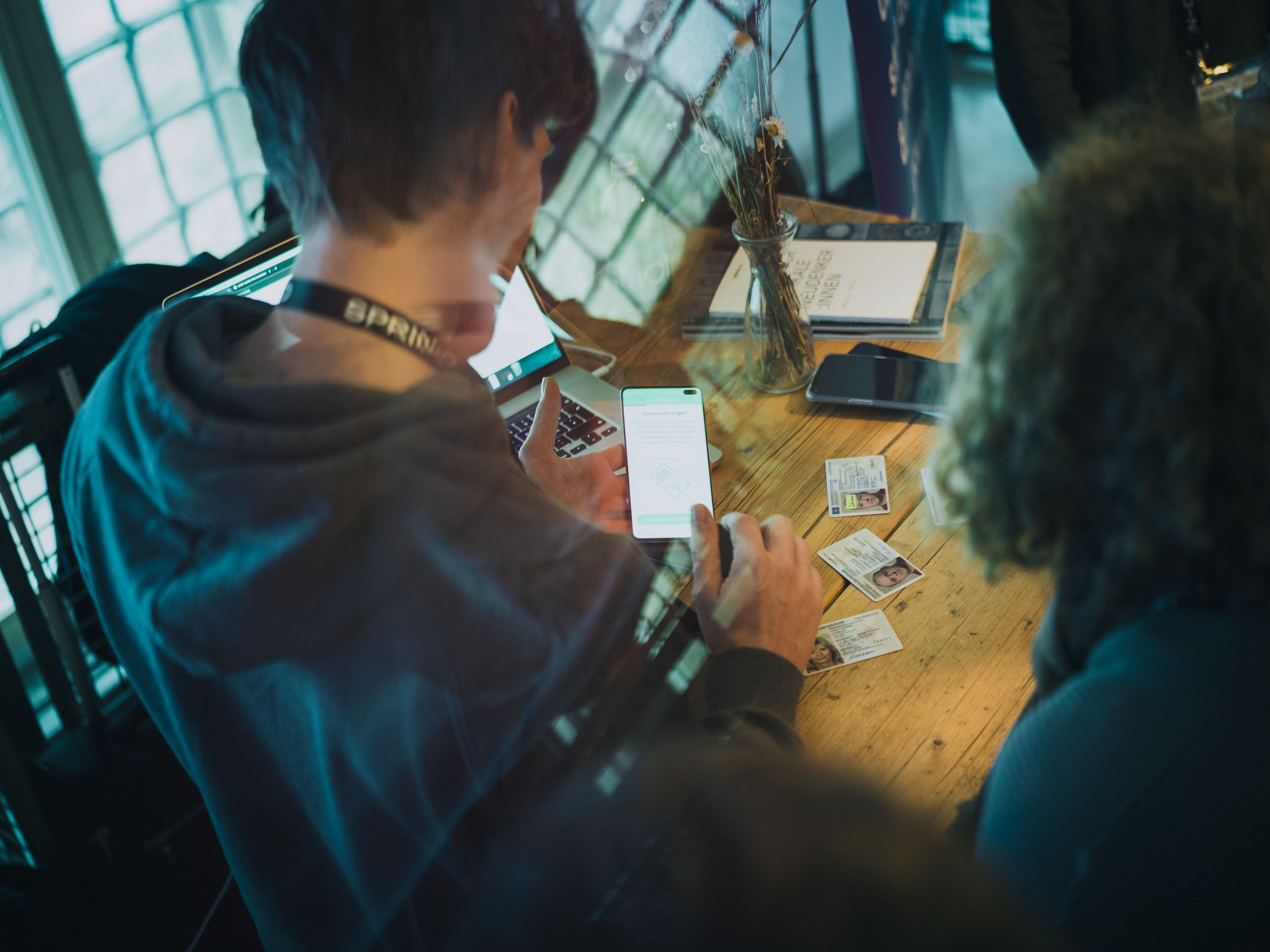 Person demonstrates an app on their smartphone